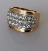 A gold signet ring with cubic zirconia panel, size O, stamped and tests for 18ct, 8.5g
