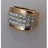 A gold signet ring with cubic zirconia panel, size O, stamped and tests for 18ct, 8.5g