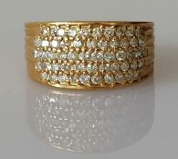 A yellow gold convex dress ring with approximately 54 round-cut diamonds