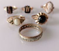 Six assorted gem-set gold rings: two late Victorian memorial rings with initials, a cameo ring