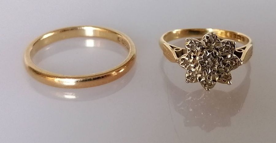 A 22ct yellow gold wedding band, 2mm, 3.45g and a mid-century diamond star ring