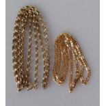 A yellow gold belcher or rolo neck chain, 68 cm, 12g and another fancy link neck chain