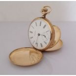 A Waltham stem-wind gold full-hunter pocket watch with white enamel dial, 42mm