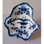 A Dr. Wall Worcester porcelain leaf-shape pickle dish in a cobalt blue floral pattern, crescent mark