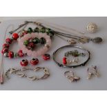 A selection of silver based gem-set jewellery to include pendant neck chains, rings, bracelets