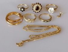 An assortment of five 9ct yellow gold gem-set rings and a pair of earrings, various sizes