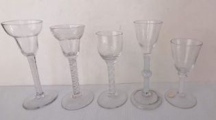Five George III lead wine glasses: a pan topped bowl with mixed twist pair of spirals outside opaque
