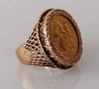 An Edwardian gold half sovereign ring, 1908, the pierced shank unmarked, but testing for 9ct, 10.66g