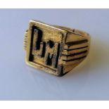 A yellow gold signet ring with initials LM, stamped and tests for 18ct, size I1/2, 11.6g