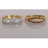 Two yellow gold graduated five-stone claw-set diamond rings: the first with old-cut diamonds