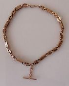 An Edwardian rose gold heavy fancy-link Albert chain with T-bar and one lobster clasp, 51 cm, 53g