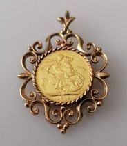 A mounted George V gold full sovereign, 1912, mount hallmarked 9ct, 14.7g
