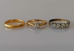 A 22ct yellow gold wedding band, 3.6g; a yellow gold solitaire diamond ring,