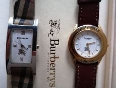 Two Burberry ladies wristwatches (one box) and a cased DKNY ladies cocktail watch (3)