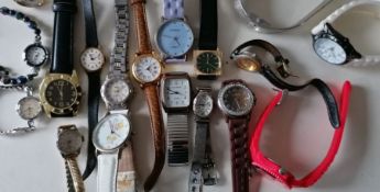 A selection of eighteen ladies fashion watches