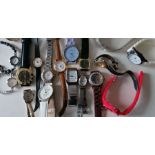 A selection of eighteen ladies fashion watches