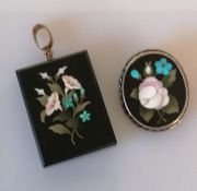 A pietra dura pendant of square form, 3.5 x 2.5 cm, with inlaid floral decoration and vacant oval ph