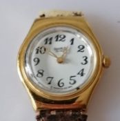 A Swatch vintage ladies watch with original leather strap (damaged) and Swatch box