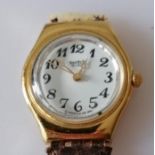 A Swatch vintage ladies watch with original leather strap (damaged) and Swatch box