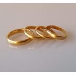 Four 22ct yellow gold wedding bands, sizes O (4mm), K, I, L1/2, all hallmarked, 13.75g (4)