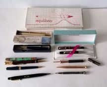 An assortment of eleven pens, pencils including 1935 Jubilee, Coronation 1953, Platignum Petit, etc