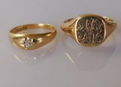A diamond-set gypsy ring on a yellow gold setting, the cushion-cut diamond approximately 0.05 carats