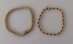 Two 9ct yellow gold tennis or line bracelets with diamond and sapphire decoration