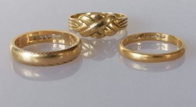 A 22ct yellow gold wedding band, 2mm, 2.5g; another 18ct yellow gold, 3mm, both hallmarked