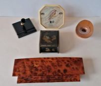 A vintage Scheaffer pen holder, an Ercol wooden inkwell with glass liner, a burr walnut pen tray