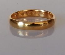 A 22ct yellow gold wedding band, size V, 4mm, 4.76g