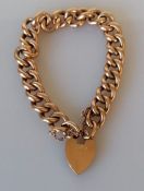 A 9ct rose gold curb-link bracelet with heart-shape locket, 14 cm, hallmarked, 22.35g