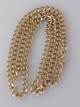 A 9ct yellow gold flat curb-link neck chain with safety chain, 75 cm, hallmarked, 30g