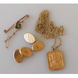 A gold St. Christopher's pendant with chain, pair of oval cufflinks with etched decoration, all hall