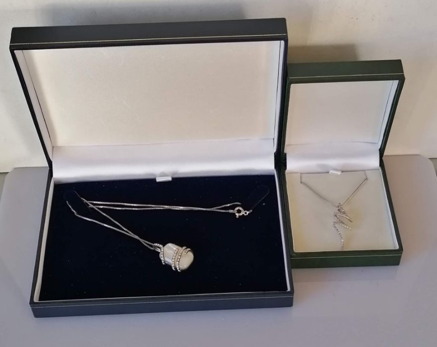 Two silver chain necklaces, one with a mother-of-pearl pendant surmounted with tiny diamonds - Image 2 of 2