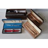 A mixed collection of seven Cross pens in five boxes