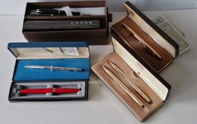 A mixed collection of seven Cross pens in five boxes