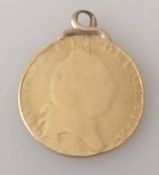 A George III gold half sovereign, mounted, date rubbed, 4.14g