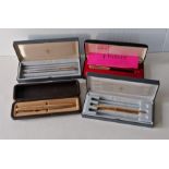 A selection of four vintage Parker fountain and ballpoint pens, all boxed