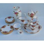 A Royal Albert Old Country Roses tea service comprising six cups/saucers/plates