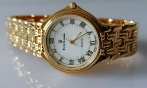 An Enzo Giomani 18k gold plated mens bracelet watch with quartz movement