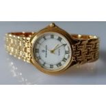 An Enzo Giomani 18k gold plated mens bracelet watch with quartz movement