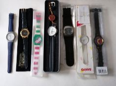 An assortment of seven fashion watches (7)