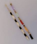 Two silver bracelets set with various coloured stones, each 18cm, boxed