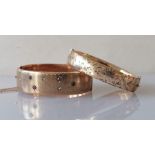 A gold hinged bangle with diamond and sapphire decoration, hallmarked 9ct, wax filled, 37.5g and ano