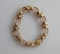 A 9ct yellow gold fancy-link bracelet, 19 cm, hallmarked, 26.5g