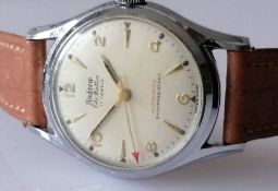 A vintage Andrew The Hatton Automatic watch with leather strap