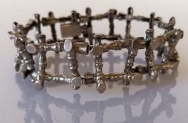 A silver .925 bracelet with bark design with box