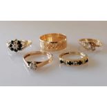 A selection of four gem-set 9ct yellow gold rings and an etched wedding band, all hallmarked