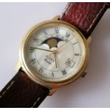 An Alfex quartz date/moon phase watch with mother-of-pearl face and leather strap