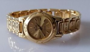 A Pelex ladies quartz 18k gold plated bracelet watch